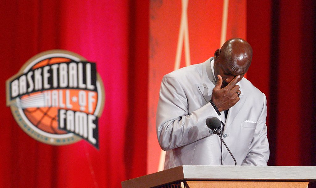 Michael Jordan crying during his hall of fame enshrinement speech.