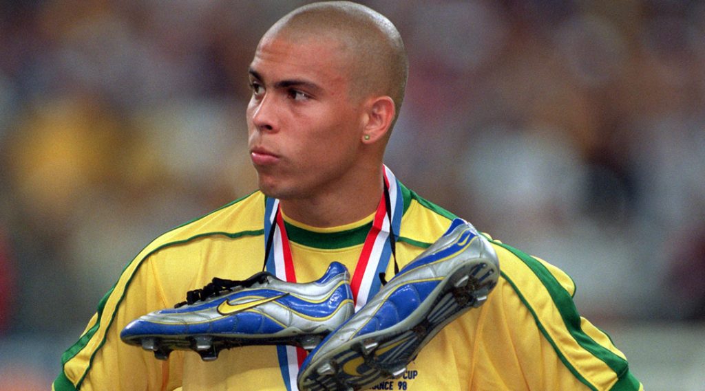 Ronaldo with his Nike boots tied around his neck after losing the World Cup final in 1998. 